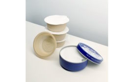 Contempo two-part packaging system comprising tin and compostable pods
