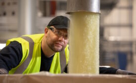 Bioplastic pellets being processed in a factory