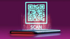 Qr code scan floating above mobile phone