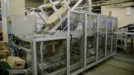 Carton packing robot in a food factory